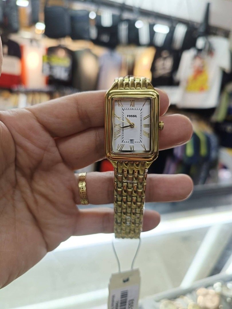 Fossil Rectangular Watch - Gold & Silver Tones (Category: Women's Watches) located in Manila. Submitted by chaionlineshop (Listing ID 1462995412, Image 2). Description: - Elegant Fossil watches - Rectangular face - Gold-toned metal band - Available in all gold or two-toned (gold/silver) - Roman numeral hour markers - Some models feature diamond accents - All watches come with original tags.