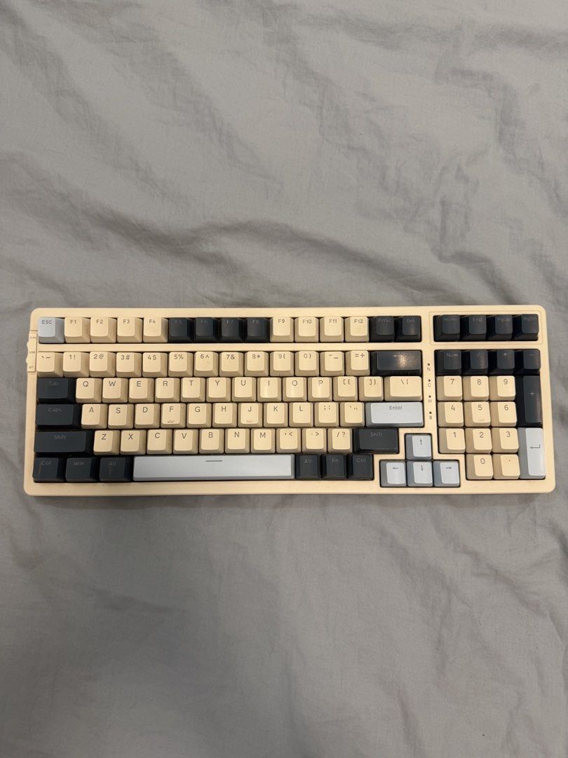FREEWOLF K8 Customized Gaming Keyboard (Category: Computer Keyboard) located in Caloocan City. Submitted by lucky.hera_ (Listing ID 1462907583, Image 1). Description: - FREEWOLF K8 Customized Gaming Keyboard - 75% Layout - Stylish Beige & Dark Grey Color Scheme - Keycaps: Mix of Beige, Dark Grey, and Light Blue - Perfect for Gaming and Typing - Excellent Working Condition.