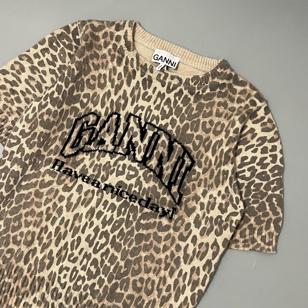 GANNI - KNITTED - LEOPARD (Category: Blouses) located in Cavite. Submitted by asianluxe (Listing ID 1462962810, Image 2). Description: GANNI - LEOPARD - KNITTED Flat measurements! Length:22.5 inches Armpit to armpit:19 inches Sleeve:10.5 inches Shoulder to shoulder:15 inches GUARANTEED AUTHENTIC Excellent condition Very presentable No flaw or damage.