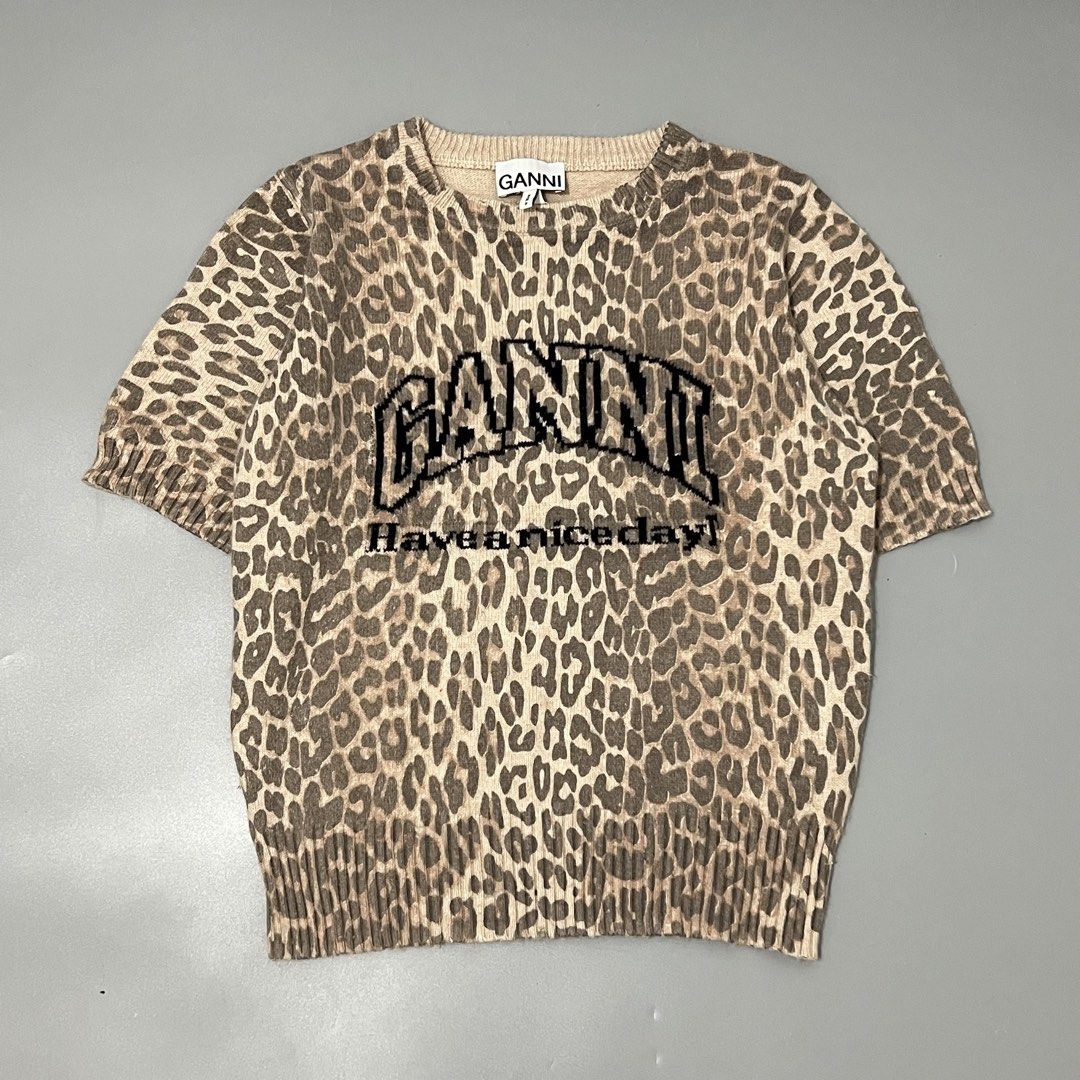 GANNI - KNITTED - LEOPARD (Category: Blouses) located in Cavite. Submitted by asianluxe (Listing ID 1462962810, Image 1). Description: GANNI - LEOPARD - KNITTED Flat measurements! Length:22.5 inches Armpit to armpit:19 inches Sleeve:10.5 inches Shoulder to shoulder:15 inches GUARANTEED AUTHENTIC Excellent condition Very presentable No flaw or damage.