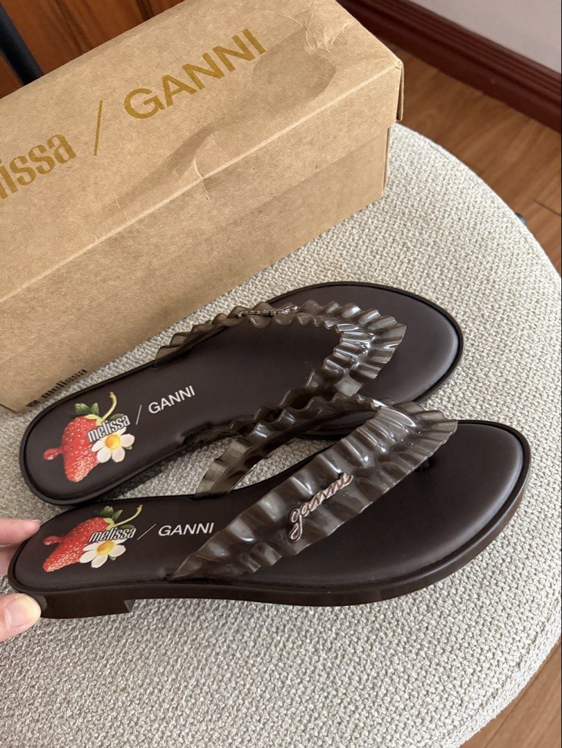 GANNI x Melissa Flip Flops in Brown (Category: Flats & Sandals) located in Paranaque City. Submitted by consciouscleanout (Listing ID 1461875258, Image 3). Description: Used twice only. Can pass off as new Size EU 40, US 9 Bought for 3,995 RFS: don't reach for it as much.