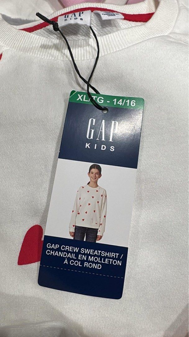 GAP Kids Crew Sweatshirt (Heart Print) (Category: Others Tops) located in Cavite. Submitted by xoxomhai (Listing ID 1463014843, Image 3). Description: GAP Kids Crew Sweatshirt (Heart Print) 💖 ₱1,000 📌 Details: • Brand: GAP Kids • Style: Crew Sweatshirt • Design: White with red/pink heart print • Size: XL/TG (14–16) • Soft & comfy — perfect for everyday wear .