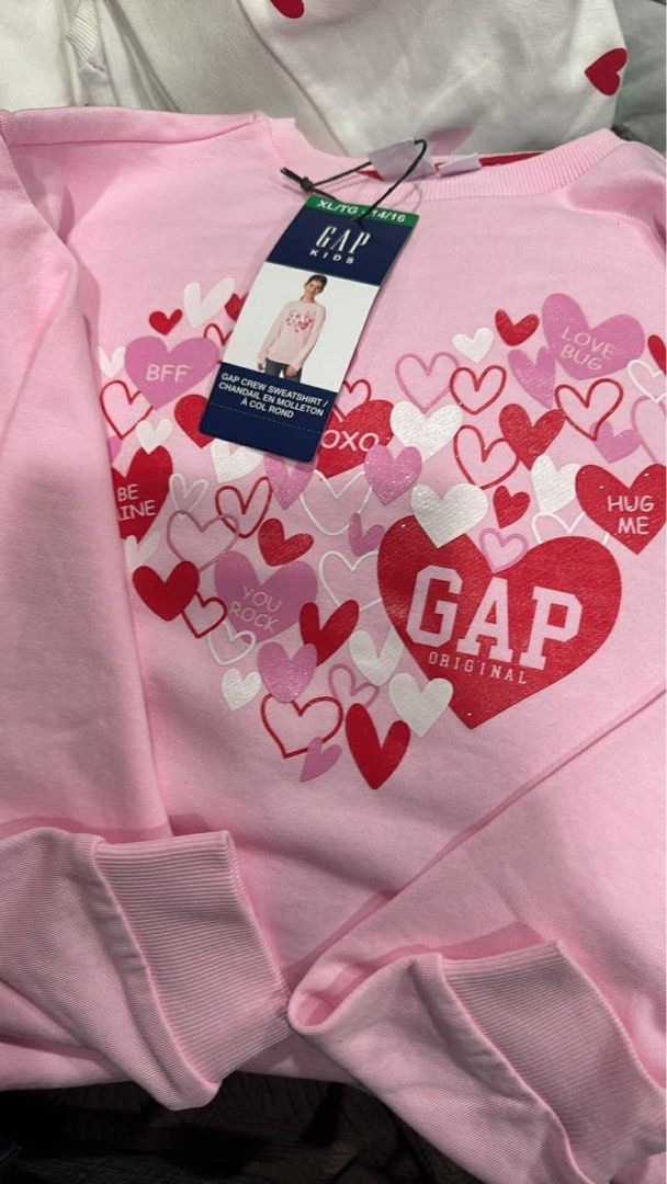 GAP Kids Crew Sweatshirt (Heart Print) (Category: Others Tops) located in Cavite. Submitted by xoxomhai (Listing ID 1463014843, Image 2). Description: GAP Kids Crew Sweatshirt (Heart Print) 💖 ₱1,000 📌 Details: • Brand: GAP Kids • Style: Crew Sweatshirt • Design: White with red/pink heart print • Size: XL/TG (14–16) • Soft & comfy — perfect for everyday wear .
