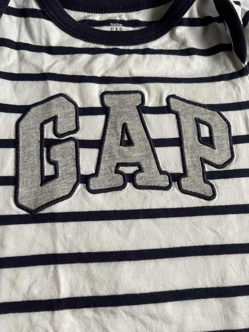 GAP Onesie (Category: Babies & Kids Fashion) located in Manila. Submitted by gshopsandwears (Listing ID 1463049685, Image 2). Description: Authentic GAP Onesie 💕 18-24 Mos on tag 💕 US bought 💕Worn Once then stored 💯Excellent condition ☀️No flaws, Used once ‼️This is personal preloved but please set proper expectation. 🚚 Shipping from Biñan, Laguna via J&T Metro Manila Rate .