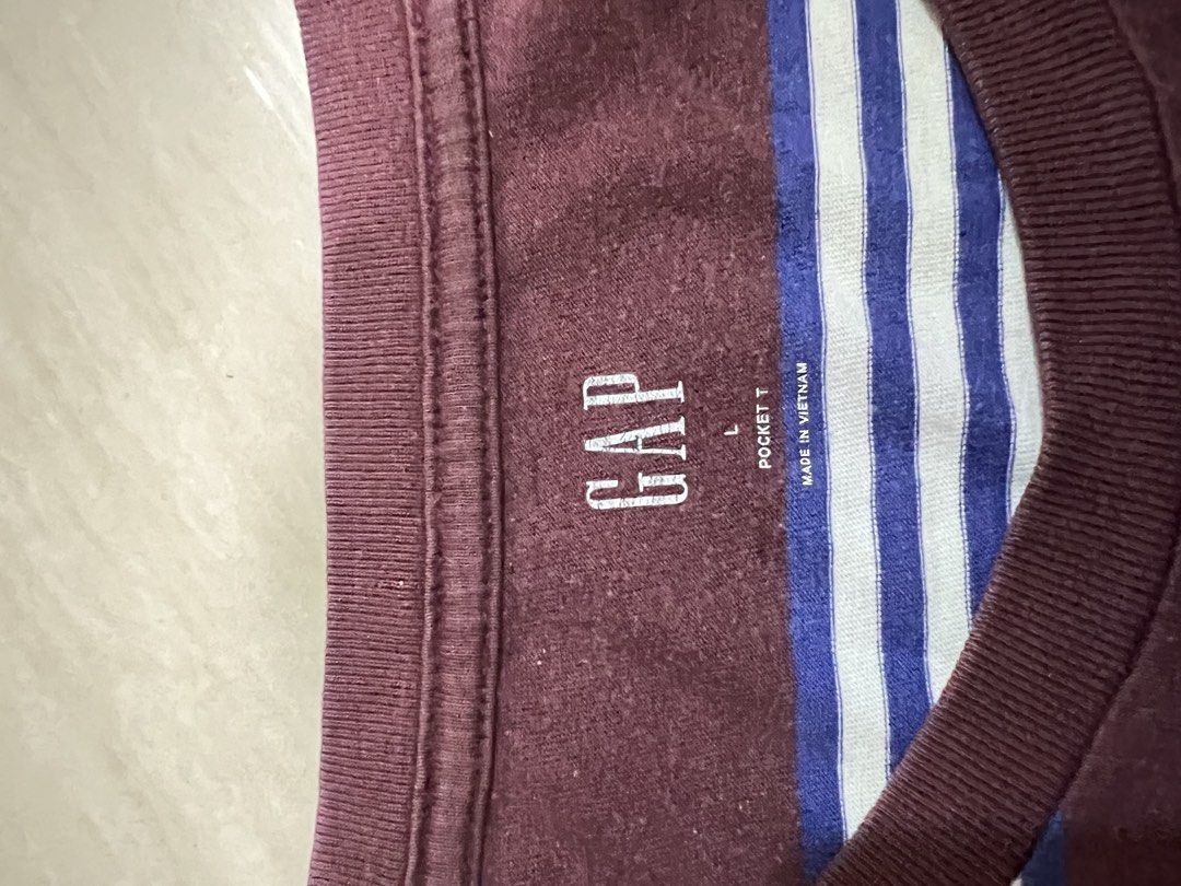 GAP Striped Pocket T-Shirt (Category: Tshirts & Polo Shirts ) located in Binan City. Submitted by huntwear_.turtle (Listing ID 1463002801, Image 2). Description: - Classic GAP pocket tee - Color: Burgundy with white and blue stripes - Size: Large (L) - Origin: Made in Vietnam - Ideal for: Casual wear - Condition: Please check photos for details.