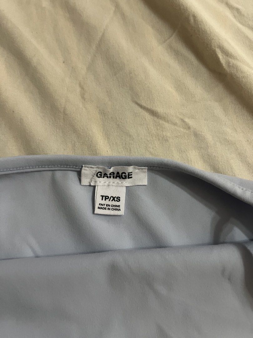 Garage Sleek Cami Top (Category: Sleeveless) located in Aguinaldo. Submitted by roversellz_ (Listing ID 1463026824, Image 2). Description: flaw is shown!.