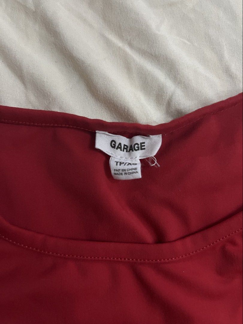 Garage Sleek Tee Top (Category: Shirts) located in Aguinaldo. Submitted by roversellz_ (Listing ID 1463026335, Image 2). Description: This color is sold out on the websitee.