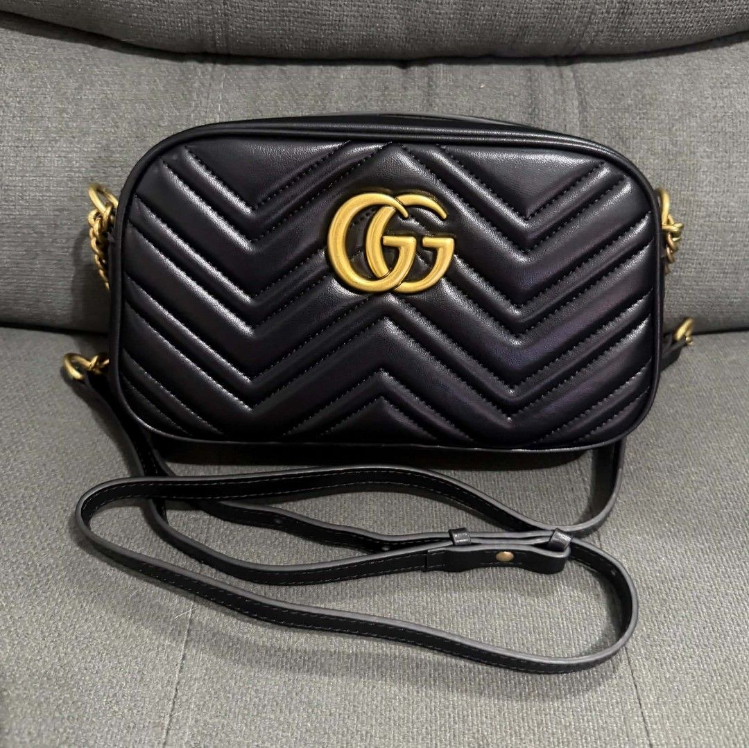 GG Marmont Camera Bag (Category: Cross-body Bags) located in Quezon City. Submitted by luxxechic (Listing ID 1462955401, Image 3). Description: coded GG underzip with black etiketa pure leather with dust bag good as new no issue actual photo posted japan preloved mop: gcash.