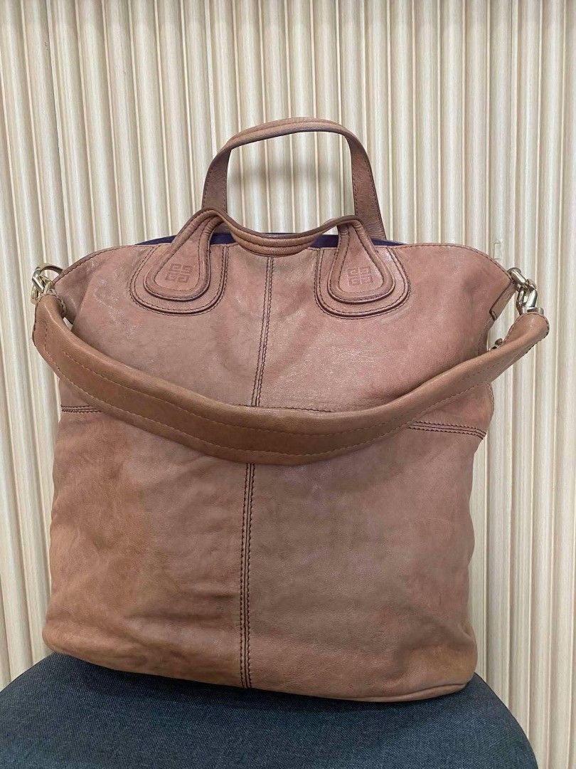 Givenchy Nightingale Shopping Lambskin Leather Bag (Category: Luxury Bags & Wallets) located in Lopez. Submitted by declutteringproxie (Listing ID 1463065485, Image 1). Description: - Authentic Givenchy Nightingale Shopping Bag - Made in Italy - Material: 100% Lambskin Leather - Features: Spacious interior with a zip pocket - Leather Texture: Beautifully soft - Includes: Original tag and leather swatch - Ideal for: Everyday use.