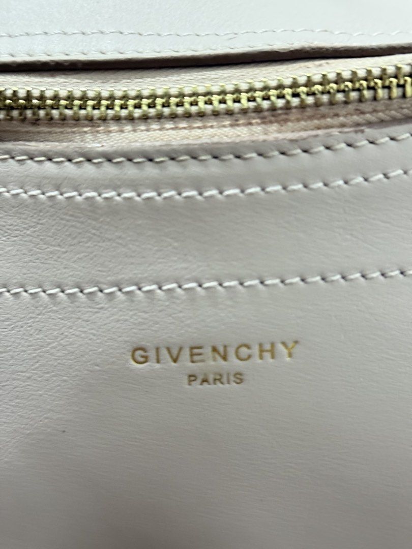 Givenchy Paris Peach Leather Shoulder Bag (Category: Luxury Bags & Wallets) located in Manila. Submitted by bilog_khairmuchuan (Listing ID 1463069455, Image 2). Description: - Authentic Givenchy Paris shoulder bag - Beautiful light pink leather - Elegant gold hardware - Stylish chain strap detail - Secure zip closure - Immaculate interior - Ideal for everyday chic.