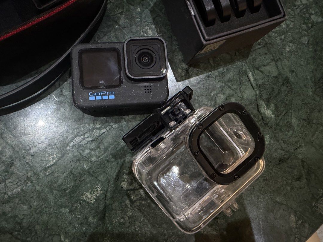 GoPro HERO12 Action Camera with Accessories (Category: Cameras) located in Makati City. Submitted by ayanna08 (Listing ID 1463064614, Image 1). Description: - GoPro HERO12 action camera - Protective waterproof case for diving included - Floating hand grip for water activities/diving - Charger and 1 extra battery - Set of ND/PL filters for enhanced shots - Additional mount for versatility - Case/bag included.
