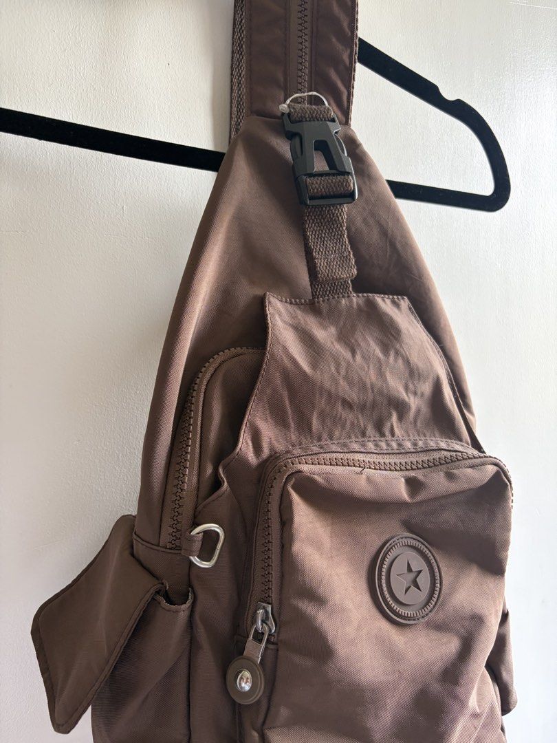 GRAB Nylon Sling Bag (Category: Cross-body Bags) located in Tarlac. Submitted by ignaciocha729 (Listing ID 1462898520, Image 2). Description: - looks like kipling - Multiple pockets for excellent organization - Adjustable strap for comfortable wear - Made from durable material - Spacious enough for daily essentials - Ideal for travel, concerts and everyday errands.