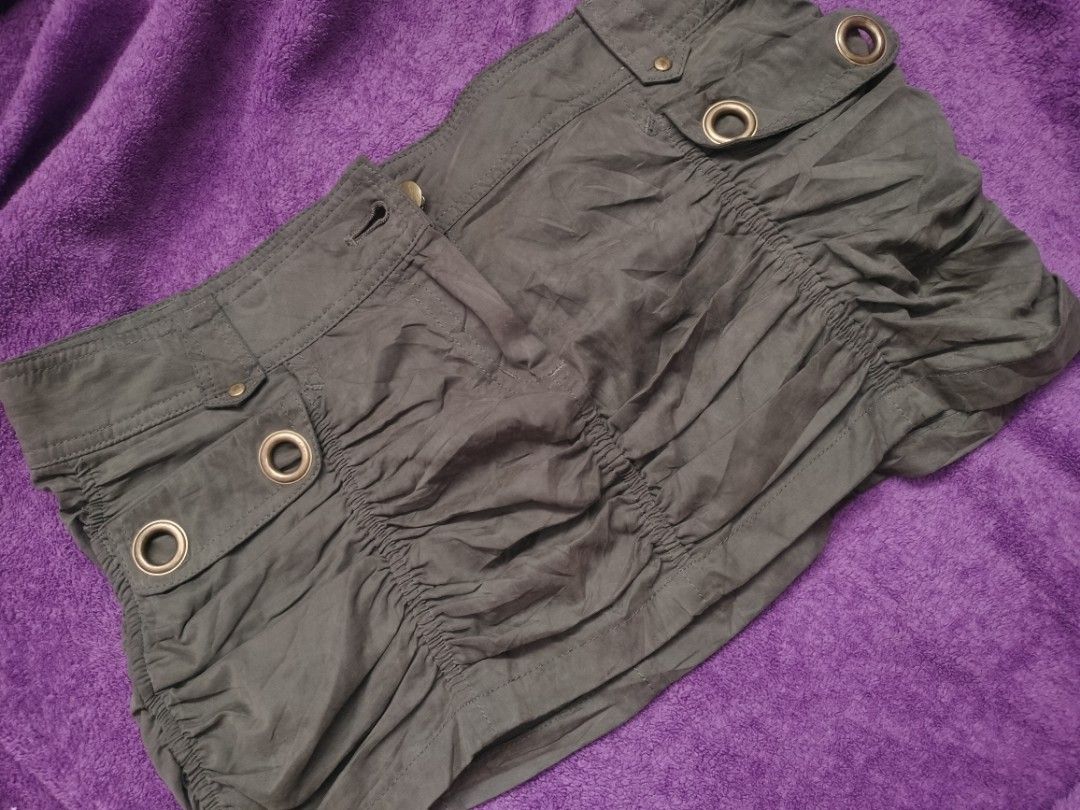 green mini skirt (Category: Skirts) located in Manila. Submitted by liz_han (Listing ID 1462978161, Image 1). Description: sf not included to the price.