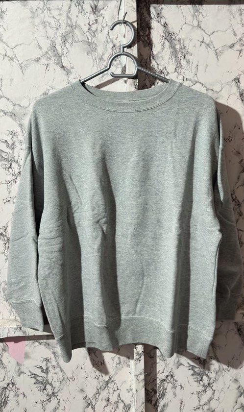 Grey Sweatshirt (Category: Coats, Jackets and Outerwear) located in Manila. Submitted by kirayychii (Listing ID 1463108604, Image 1). Description: - Used twice - Excellent condition - Best for medium to large and small for oversized fit - Used by woman - No flaws at all - Negotiable.