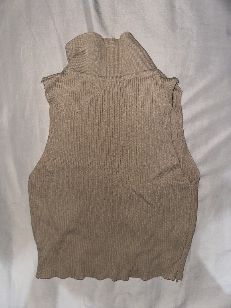 GTW URBAN Beige Ribbed Sleeveless Collared Top (Category: Sleeveless) located in Manila. Submitted by etain.xo (Listing ID 1463037879, Image 2). Description: - Beige ribbed sleeveless top from GTW URBAN - Features a collared neckline with a V-cut - Small.