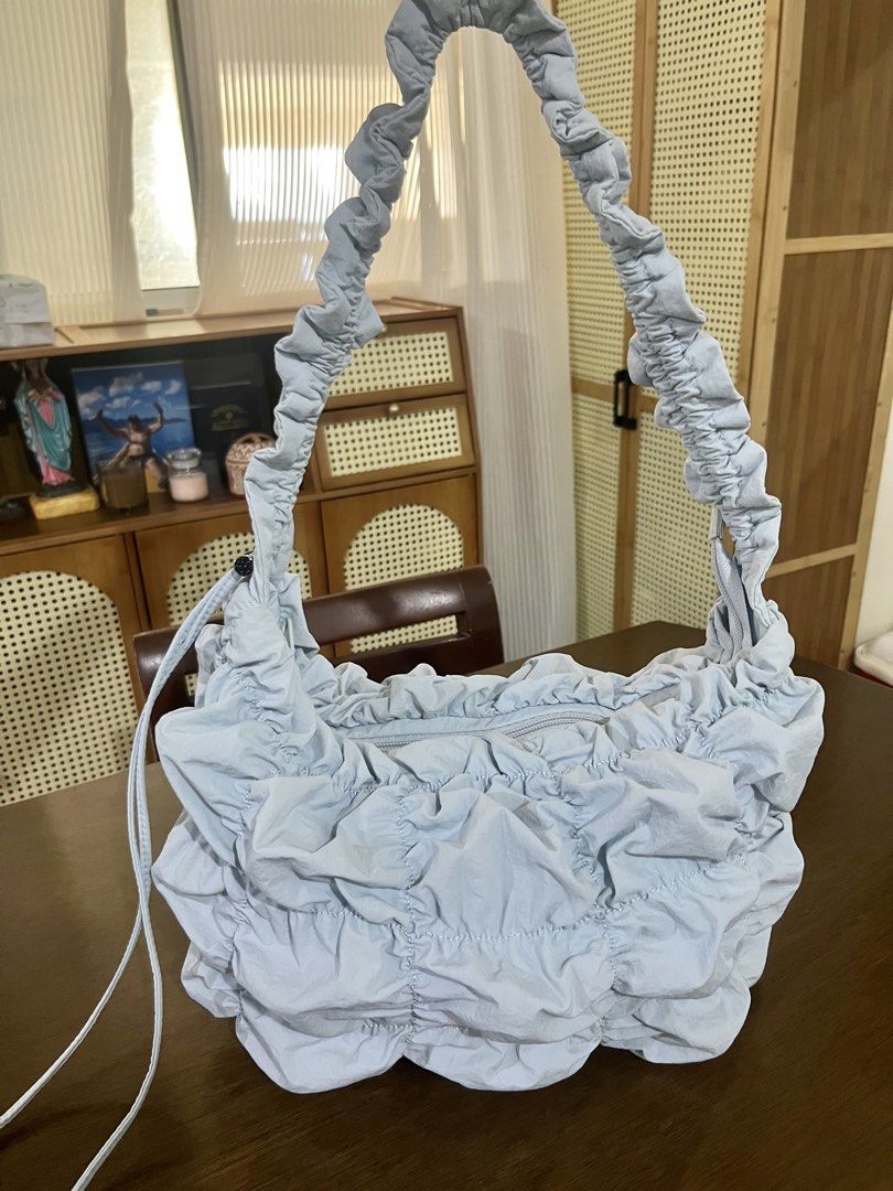 GU Gathered Shoulder Bag Light Blue (Category: Shoulder Bags) located in Mandaluyong City. Submitted by leypadilla (Listing ID 1463002530, Image 2). Description: - Brand: GU - Color: Light blue - Style: Gathered shoulder bag - Closure: Zip - Features: Internal pockets, gathered strap - Condition: lightly used - Ideal for: Everyday use.