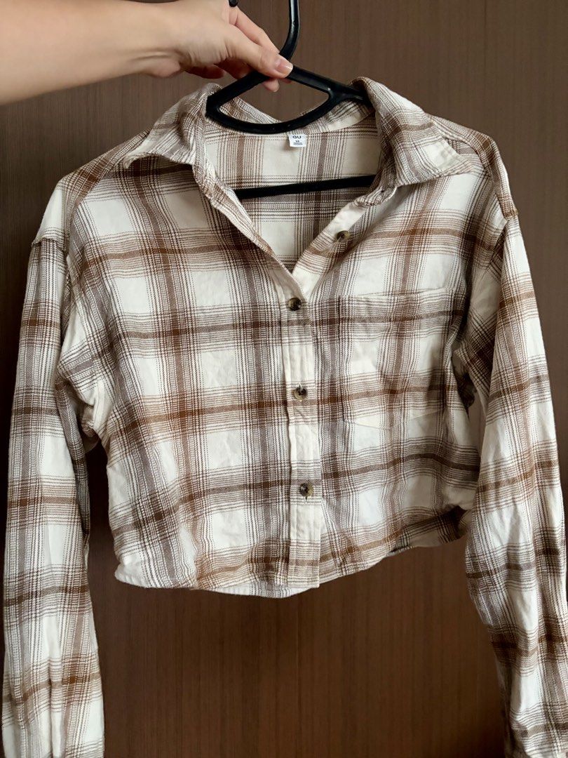 GU plaid polo (Category: Longsleeves) located in Dagupan City. Submitted by thrifttostyle (Listing ID 1463011083, Image 2). Description: no flaws.
