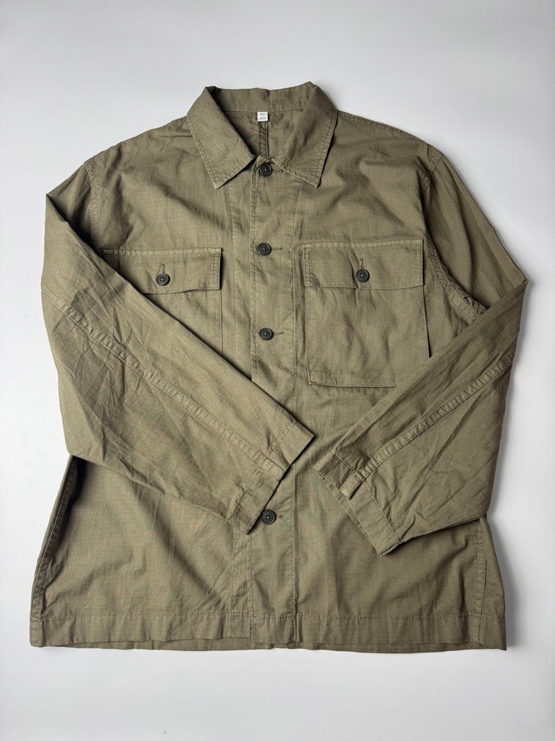 GU Uniqlo Utility Work Jacket Olive Green (Category: Coats, Jackets and Outerwear) located in Cavite. Submitted by loadeadgears (Listing ID 1463014128, Image 2). Description: - Uniqlo Olive Green Utility Jacket - Two chest pockets with button closures - Button-up front - Long sleeves with button cuffs - Ideal for casual layering - Durable and versatile.