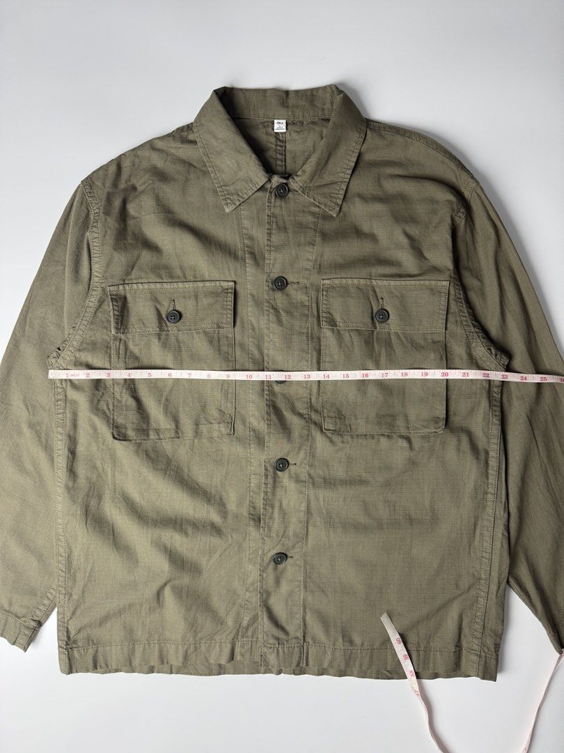GU Uniqlo Utility Work Jacket Olive Green (Category: Coats, Jackets and Outerwear) located in Cavite. Submitted by loadeadgears (Listing ID 1463014128, Image 3). Description: - Uniqlo Olive Green Utility Jacket - Two chest pockets with button closures - Button-up front - Long sleeves with button cuffs - Ideal for casual layering - Durable and versatile.