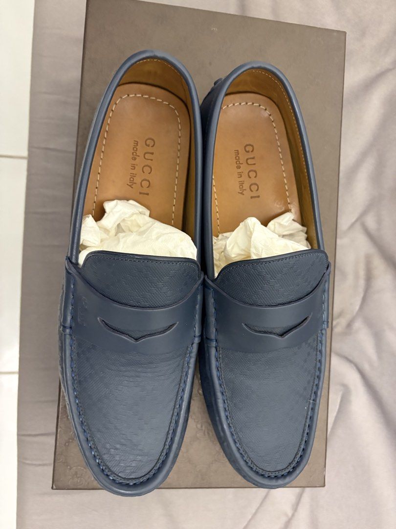 Gucci Blue Leather Driving Loafers (Category: Loafers) located in Quezon City. Submitted by AAAAAF14 (Listing ID 1463085874, Image 3). Description: in very good condition can fit 8-9US - Authentic Gucci driving loafers - Made in Italy - Premium leather with subtle embossed pattern - Classic penny loafer style with signature Gucci strap - Comes with original box and tissue paper.