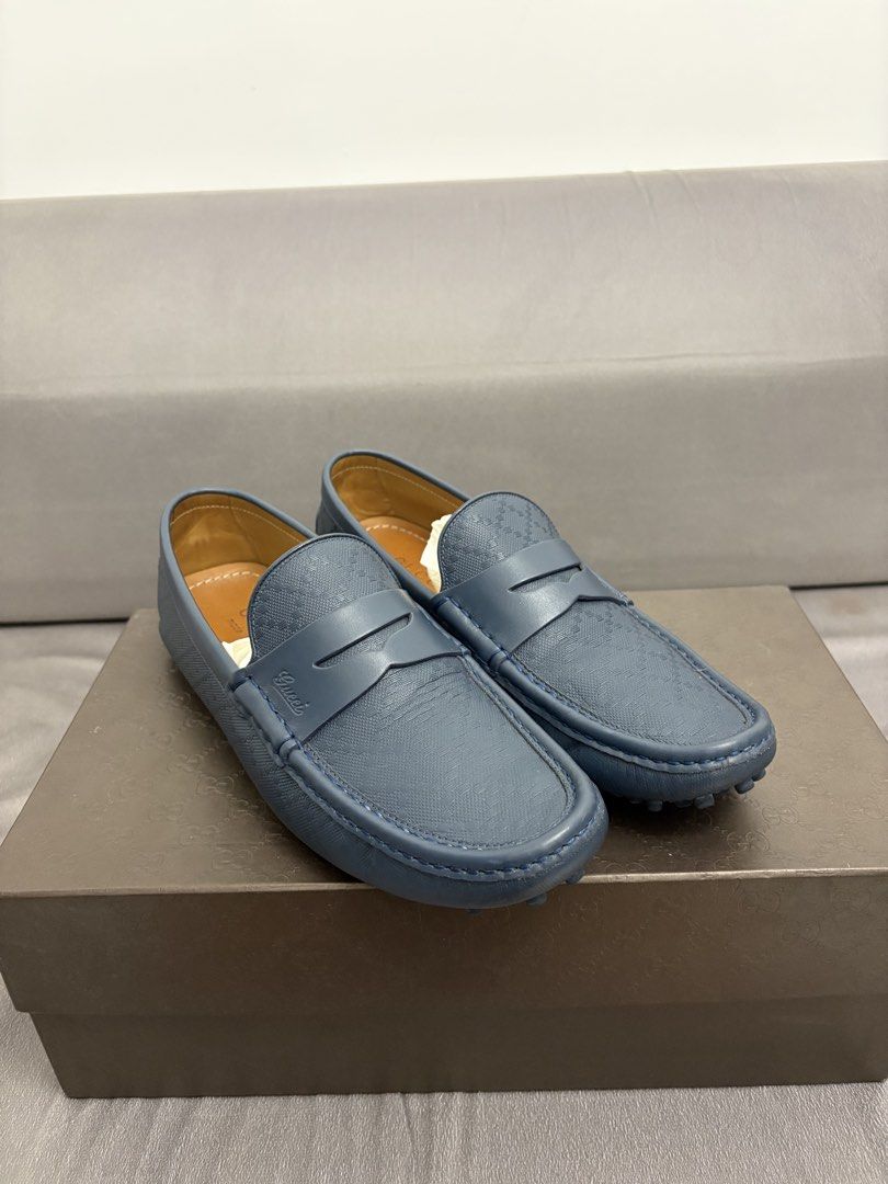 Gucci Blue Leather Driving Loafers (Category: Loafers) located in Quezon City. Submitted by AAAAAF14 (Listing ID 1463085874, Image 2). Description: in very good condition can fit 8-9US - Authentic Gucci driving loafers - Made in Italy - Premium leather with subtle embossed pattern - Classic penny loafer style with signature Gucci strap - Comes with original box and tissue paper.