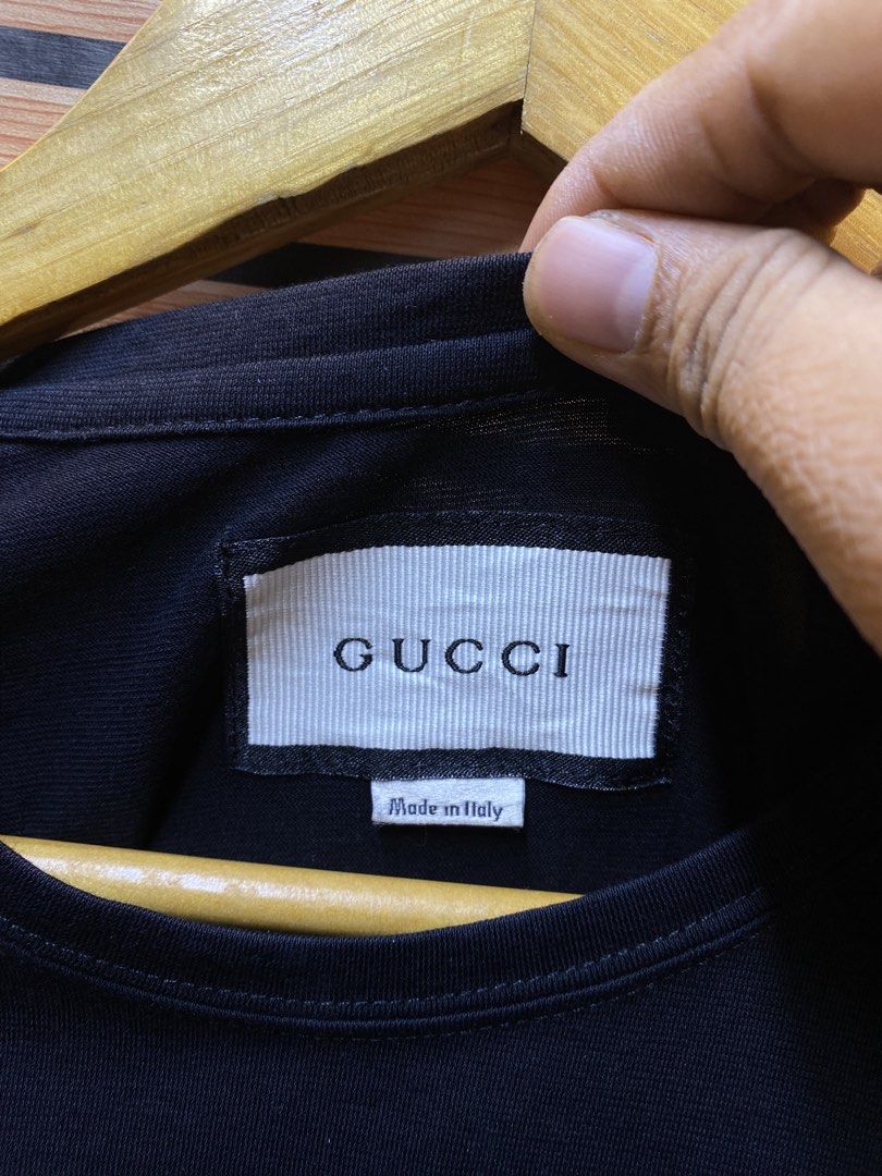 GUCCI “GG” TEE (Category: Tshirts & Polo Shirts ) located in Makati City. Submitted by drip.poww (Listing ID 1462938881, Image 3). Description: - Authentic Gucci - Color: Black - Size: Small - Dimes: 19x25 - Authentic - Excellent condition - Need wash, fresh from bale - Material: 100% Cotton Please don’t expect too much—these are thrifted (ukay) items. 😊 !!STILL NEGOTIABLE!!.