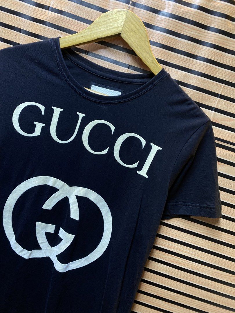 GUCCI “GG” TEE (Category: Tshirts & Polo Shirts ) located in Makati City. Submitted by drip.poww (Listing ID 1462938881, Image 2). Description: - Authentic Gucci - Color: Black - Size: Small - Dimes: 19x25 - Authentic - Excellent condition - Need wash, fresh from bale - Material: 100% Cotton Please don’t expect too much—these are thrifted (ukay) items. 😊 !!STILL NEGOTIABLE!!.