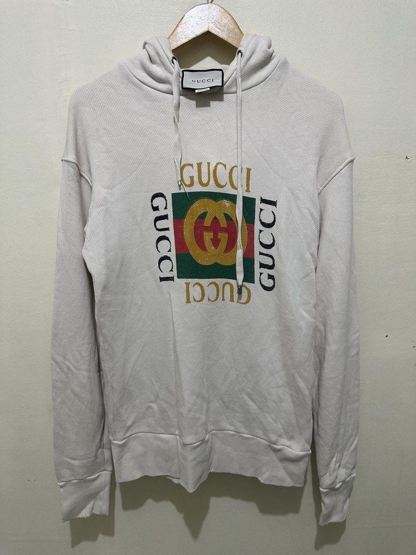 Gucci Hoodie (Category: Coats, Jackets and Outerwear) located in Tagum. Submitted by ritarits572 (Listing ID 1463059231, Image 1). Description: - Gucci hoodie in cream - Features iconic Gucci logo and interlocking Gs on the front - Made in Italy - A must-have for any Gucci fan - Size XS, 20.5 x 27.5 - Stains, needs laundry .