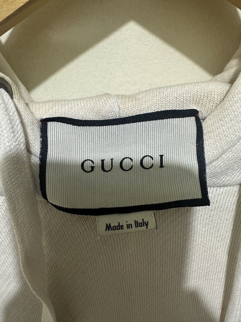 Gucci Hoodie (Category: Coats, Jackets and Outerwear) located in Tagum. Submitted by ritarits572 (Listing ID 1463059231, Image 3). Description: - Gucci hoodie in cream - Features iconic Gucci logo and interlocking Gs on the front - Made in Italy - A must-have for any Gucci fan - Size XS, 20.5 x 27.5 - Stains, needs laundry .