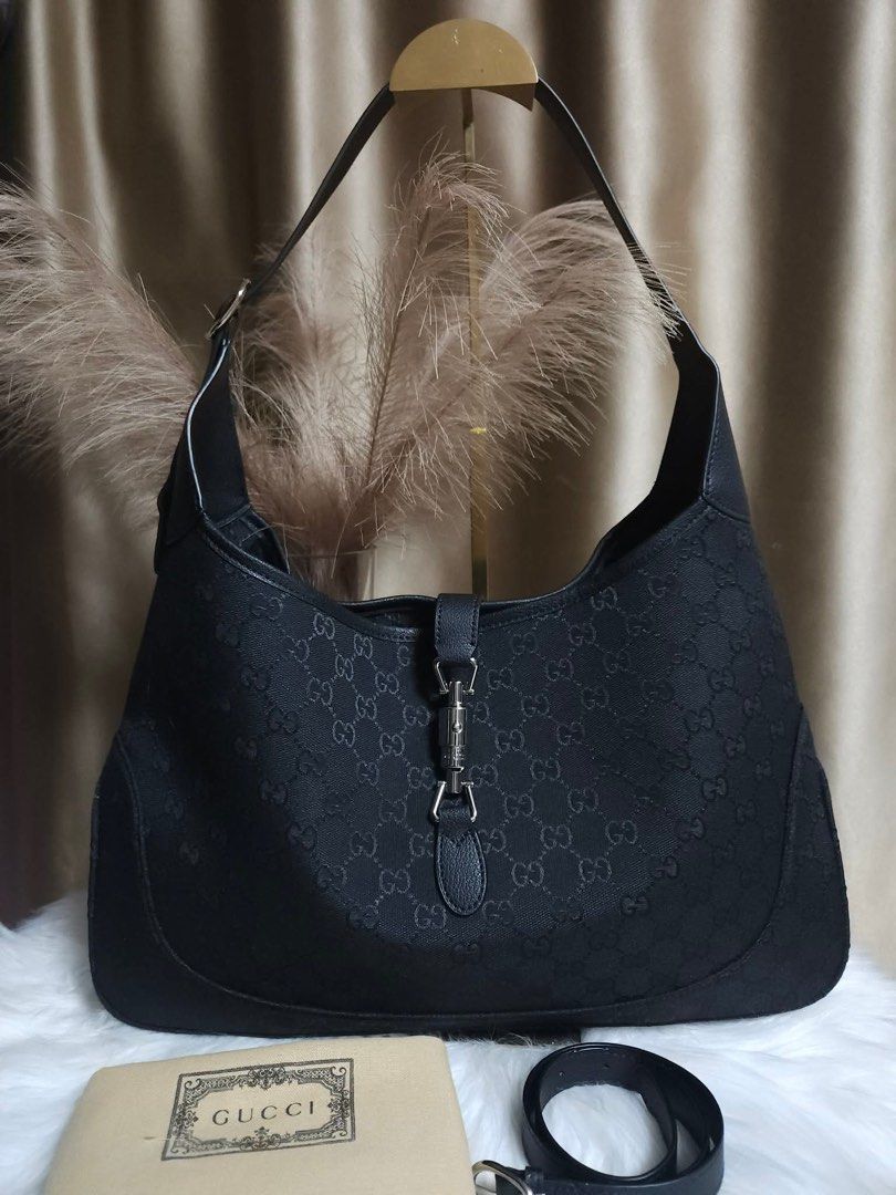 Gucci Jackie Hobo Large (Category: Luxury Bags & Wallets) located in Pasay City. Submitted by 2ndloveforever2023 (Listing ID 1462900712, Image 1). Description: - Gucci Hobo Bag - Japan Sourced (NGA) - Color: Black GG Canvas with Leather Trim - Hardware: Silver detail on front closure - Strap: Single shoulder strap - Origin: Made in Italy - Ideal for: Great everyday bag.
