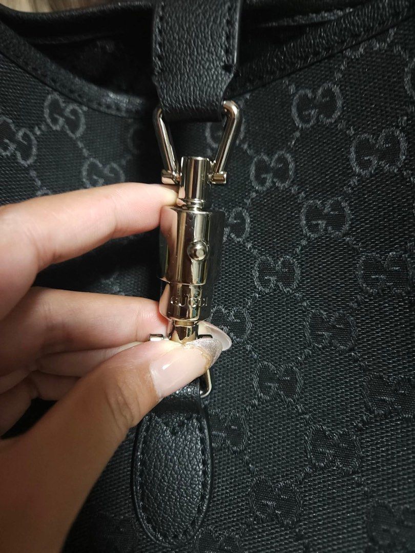 Gucci Jackie Hobo Large (Category: Luxury Bags & Wallets) located in Pasay City. Submitted by 2ndloveforever2023 (Listing ID 1462900712, Image 3). Description: - Gucci Hobo Bag - Japan Sourced (NGA) - Color: Black GG Canvas with Leather Trim - Hardware: Silver detail on front closure - Strap: Single shoulder strap - Origin: Made in Italy - Ideal for: Great everyday bag.