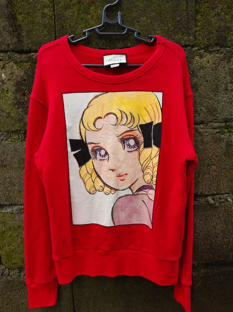 Gucci Red Sweatshirt with "GUCCY" Logo (Category: Luxury Apparel) located in Antipolo. Submitted by swift.cocopasion (Listing ID 1463016586, Image 1). Description: - Authentic Red Gucci Sweatshirt - Features the iconic 'GUCCY' logo on the back - Made in Italy - Ideal for stylish casual wear.