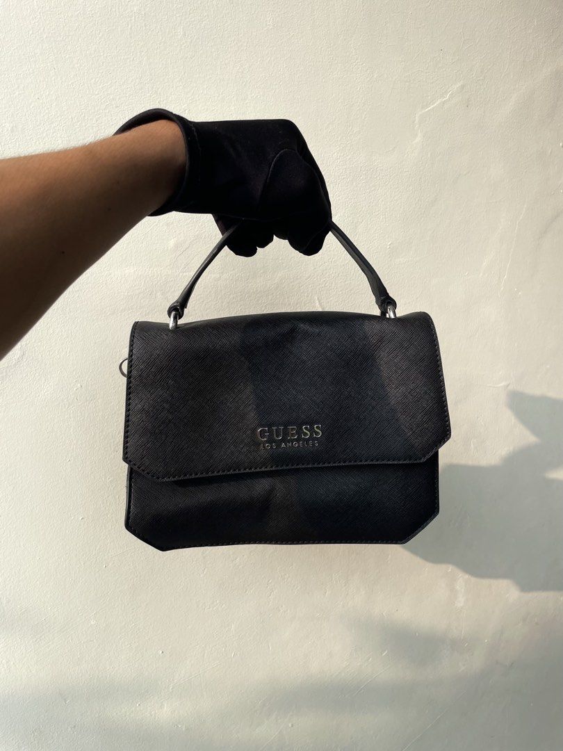 Guess Llano Mini Bag (Category: Purses & Pouches) located in Butuan. Submitted by prestigephilippines (Listing ID 1462917420, Image 2). Description: Excellent condition No issue Shipping worldwide 🌍.