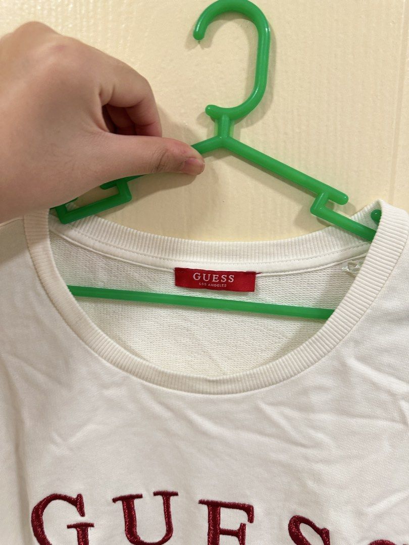 [GUESS] white sweater with red embroidery (Category: Coats, Jackets and Outerwear) located in Cainta. Submitted by m4tchyyy (Listing ID 1463025619, Image 2). Description: 🌀 never worn before 🍀 mop: gcash or bdo 🍀 mod: j&t, ggx, or same day delivery within mm.