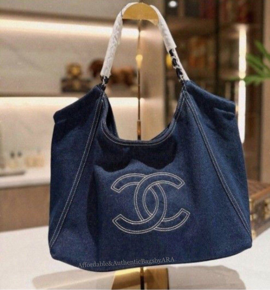 GWP CHANEL DENIM TOTE BAG (Category: Tote Bags) located in Daet. Submitted by ecassenluxuries (Listing ID 1462937279, Image 1). Description: 📌 FIXED PRICE ALREADY ▫️Classic Chanel tote bag ▫️Material: Dark blue denim with white contrast stitching ▫️Iconic embroidered CC logo on the front ▫️Interior lining with repeating Chanel logo pattern ▫️Spacious design, ideal for everyday use ✅ All items are guaranteed 💯% AUTHENTIC GWP ITEM ✅ Onhand 🪧STRI