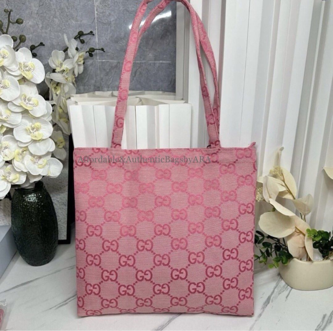 GWP GUCCI MONOGRAM CANVAS TOTE BAG (Category: Tote Bags) located in Daet. Submitted by ecassenluxuries (Listing ID 1462935591, Image 2). Description: 📌 FIXED PRICE ALREADY ✅ All items are guaranteed 💯% AUTHENTIC GWP ITEM ▫️Authentic GWP Pink Gucci Tote Bag ▫️Features iconic GG pattern ▫️ Dimensions: 35cm x 38 cm ▫️Adorable pineapple graphic patch ▫️Secure zipper closure ▫️Comes with original tags ▫️Ideal for everyday use ✅ Onhand 🪧STRICTLY PAY