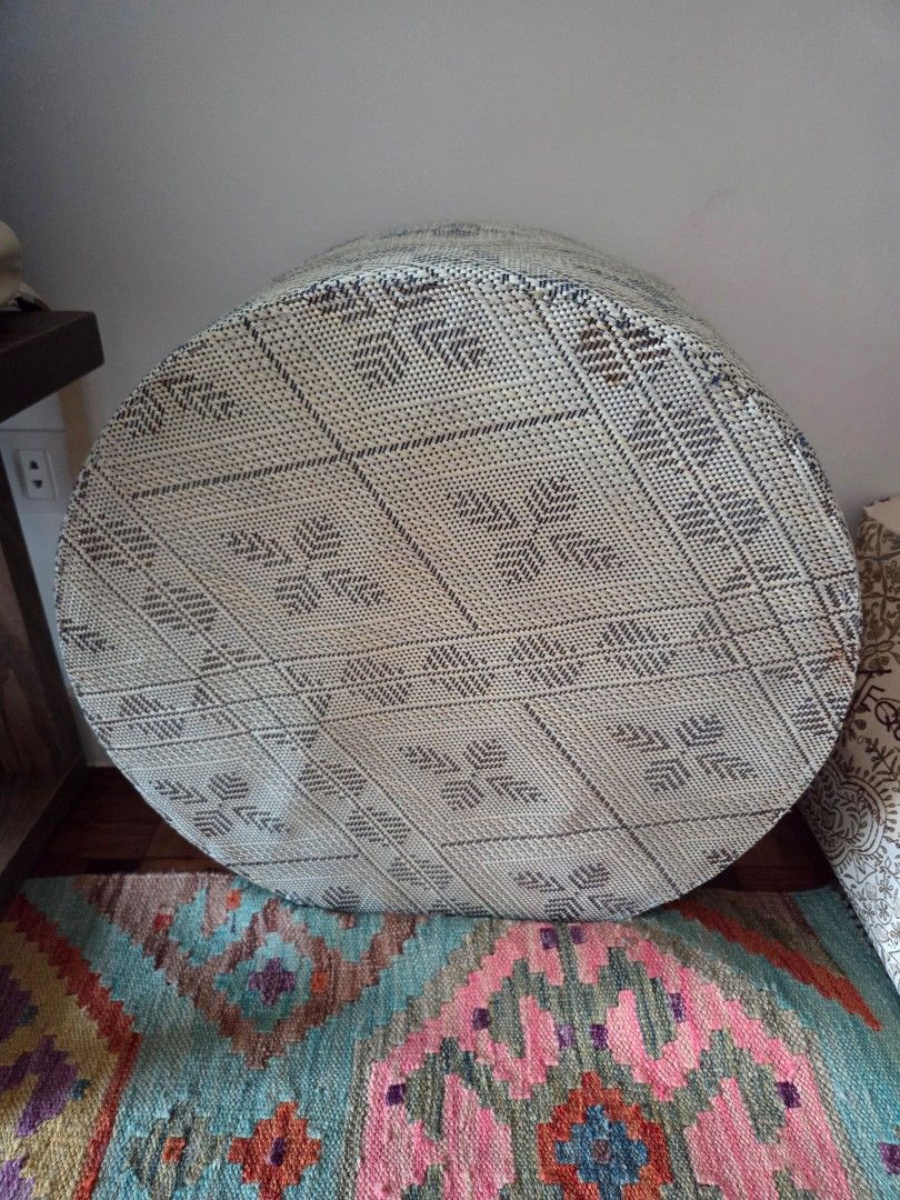 Halo Halo Mini Sopa (Category: Chairs) located in Makati City. Submitted by gcmp1 (Listing ID 1462908009, Image 2). Description: - Round woven pouf - Features a stylish geometric pattern in blue and cream - Versatile: Use as extra seating or a comfortable footrest - Good condition - Adds texture and visual interest to any room - Ideal size for living rooms or bedrooms original price = 6,500. size = 8x20 inches..