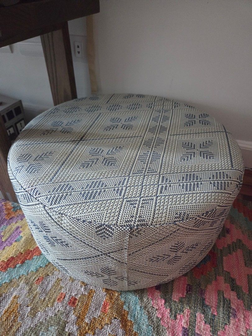 Halo Halo Mini Sopa (Category: Chairs) located in Makati City. Submitted by gcmp1 (Listing ID 1462908009, Image 1). Description: - Round woven pouf - Features a stylish geometric pattern in blue and cream - Versatile: Use as extra seating or a comfortable footrest - Good condition - Adds texture and visual interest to any room - Ideal size for living rooms or bedrooms original price = 6,500. size = 8x20 inches..