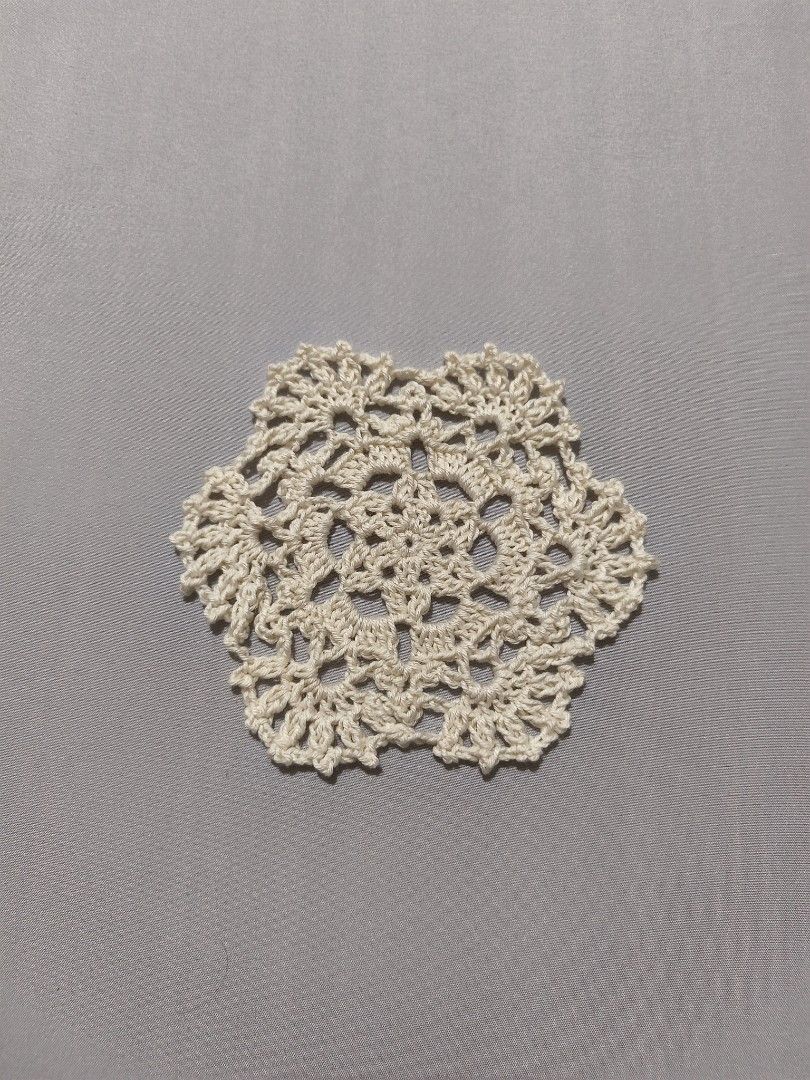 Handmade Crochet Hexagon Doily Coaster (Category: Coffee & Tea Tableware) located in Mandaluyong City. Submitted by aeriiicrochet (Listing ID 1463023955, Image 1). Description: - Size: 4.5 inches - Protects surfaces or decorates - Adds a vintage touch - Made from 100% cotton yarn.