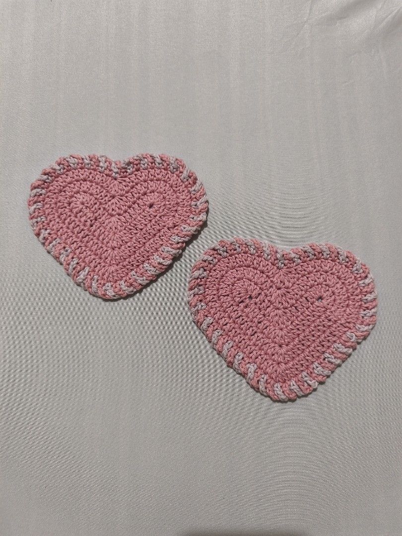 Handmade Pink Crochet Heart Coasters (Category: Coffee & Tea Tableware) located in Mandaluyong City. Submitted by aeriiicrochet (Listing ID 1463026896, Image 2). Description: - Set of 2 (PHP 350) - Size: 5 inches - 100% cotton yarn - Pretty pink with light lavender -This is my only stock & I don't plan on making more anytime soon..