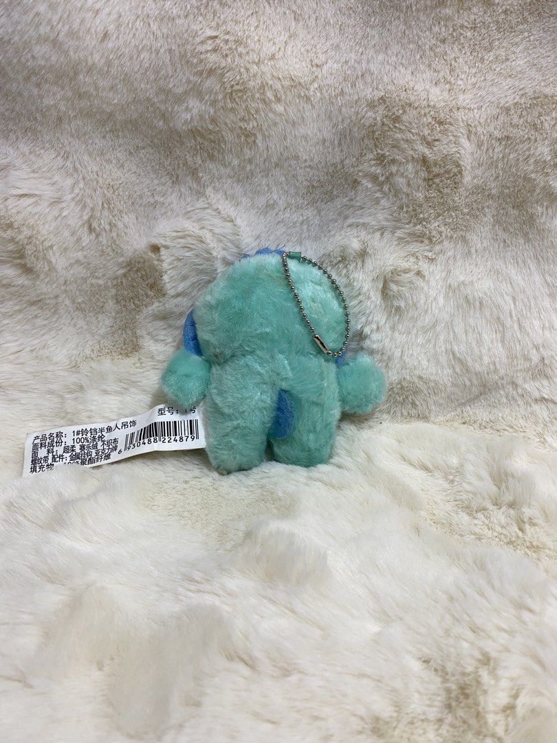 Hangyodon Plush Toy Keychain (Category: Plushies & Soft Toys) located in Kalibo. Submitted by ollie_stuffshop (Listing ID 1463079318, Image 2). Description: Before you send your inquiries: ❗️Last Price is already posted ❗️Manage your expectations, WYSIWYG ❗️May need washing ❗️Dropoff is every Wednesday & Sunday - Adorable Hangyodon plush toy - Features a convenient keychain attachment - Eye-catching teal blue color with a cute pink tongue detail 