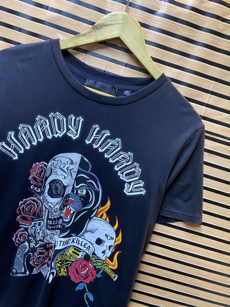 Hardy Hardy “Bone skull” Graphic tee (Category: Tshirts & Polo Shirts ) located in Makati City. Submitted by drip.poww (Listing ID 1462936220, Image 2). Description: - Authentic Hardy Hardy - Color: Black - Size: Meduim - Dimes: 21x26 - Authentic - Excellent condition - Need wash, fresh from bale - Material: 100% Cotton Please don’t expect too much—these are thrifted (ukay) items. 😊 !!STILL NEGOTIABLE!!.
