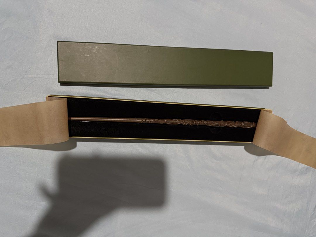 Hermione’s Wand with Box (Category: Western Merchandise) located in Manila. Submitted by kia.co (Listing ID 1463020241, Image 2). Description: - Hermione’s wand - Features a detailed, twisted design - Includes original green box - Ideal for Harry Potter fans and collectors - Bought in New York .