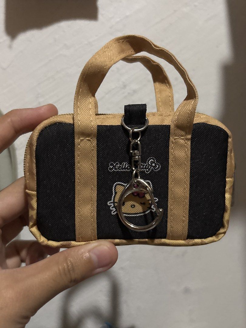 Hello Kitty Tan Bag Keychain (Category: Purses & Pouches) located in Cavite. Submitted by starrvx (Listing ID 1463054129, Image 2). Description: .
