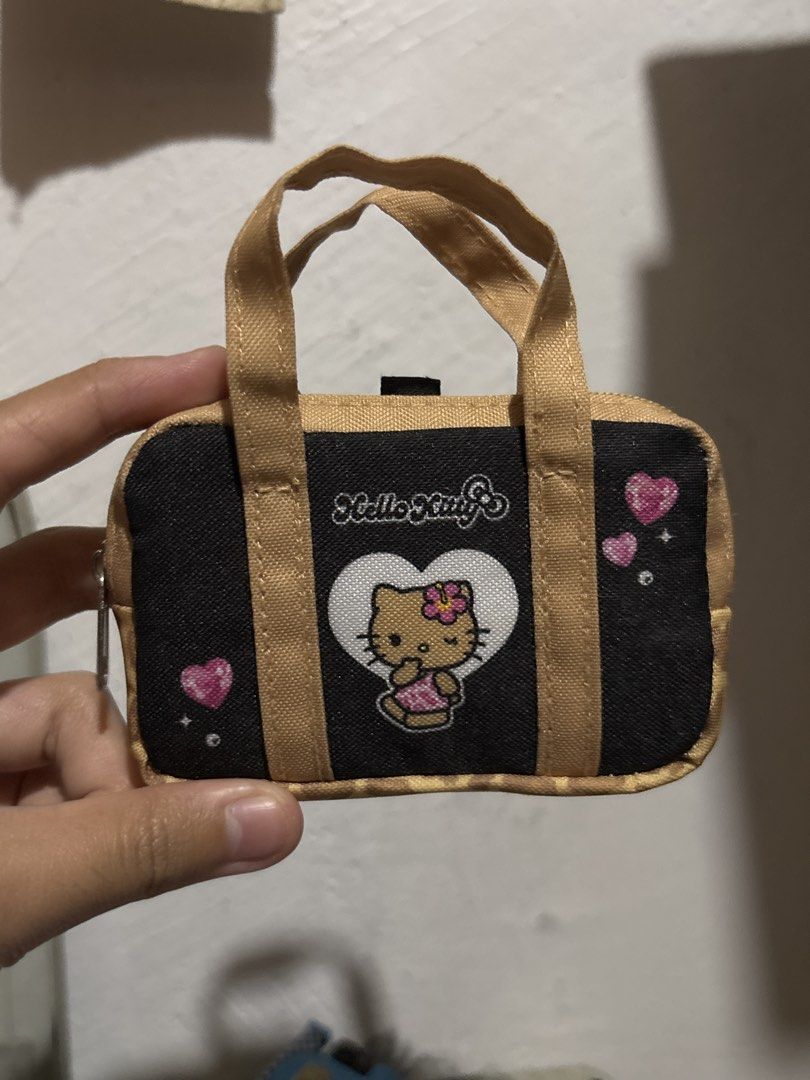 Hello Kitty Tan Bag Keychain (Category: Purses & Pouches) located in Cavite. Submitted by starrvx (Listing ID 1463054129, Image 1). Description: .