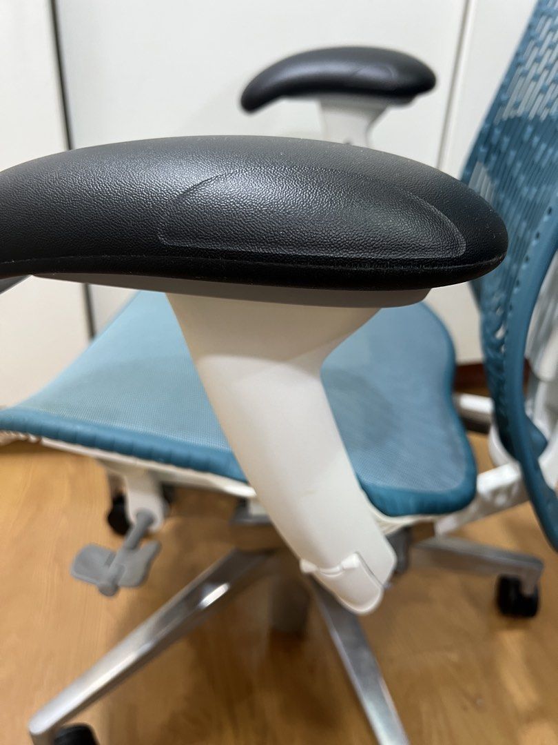 Herman Miller Mirra 2 (Category: Office Furniture & Fixtures) located in Manila. Submitted by darrensyy (Listing ID 1463092575, Image 3). Description: - Ergonomic office chair in a stylish teal color. - Breathable mesh back and seat for maximum comfort. - Adjustable armrests for personalized support. - Smooth-rolling casters for effortless mobility. - Ideal for extended work sessions. - Shows minor signs of use on the seat mesh. - Overall in good