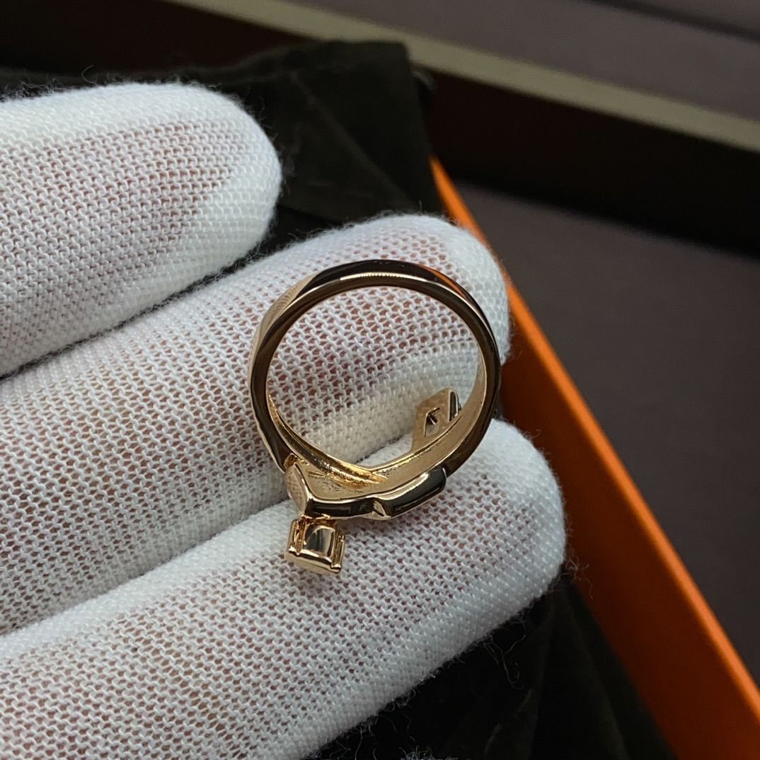 Hermes outlet Rose Gold Diamond Ring (Category: Rings) located in San Juan City. Submitted by zenocean-f9dfa7 (Listing ID 1463051032, Image 3). Description: - Authentic outlet Hermes ring - Crafted in rose gold - Adorned with sparkling diamonds - Features a charming knot and padlock design - Adds a luxurious touch to any outfit - Comes with original packaging.