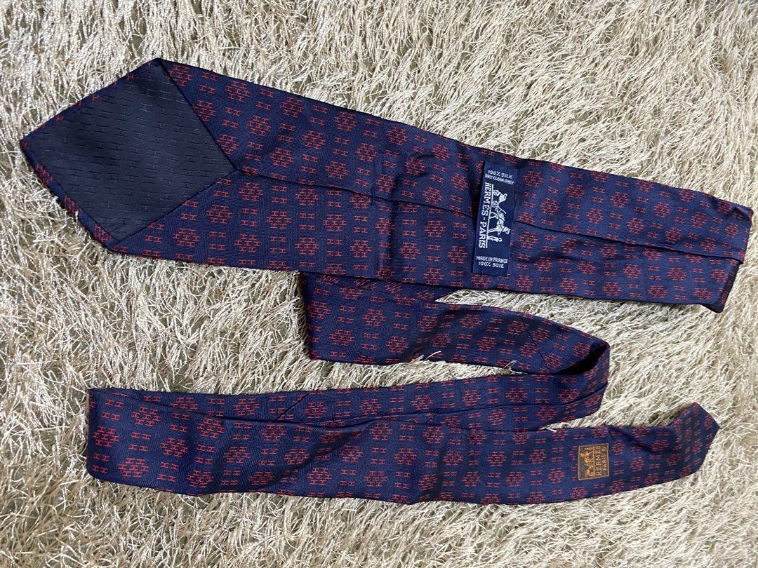 Hermes Paris Silk Tie Navy Red Pattern (Category: Ties) located in Bulacan. Submitted by rich2545 (Listing ID 1462906877, Image 3). Description: - Authentic Hermes Paris Tie - 100% Silk - Classic Red 'H' Pattern on Navy Blue - Made in France - Elevates any outfit.