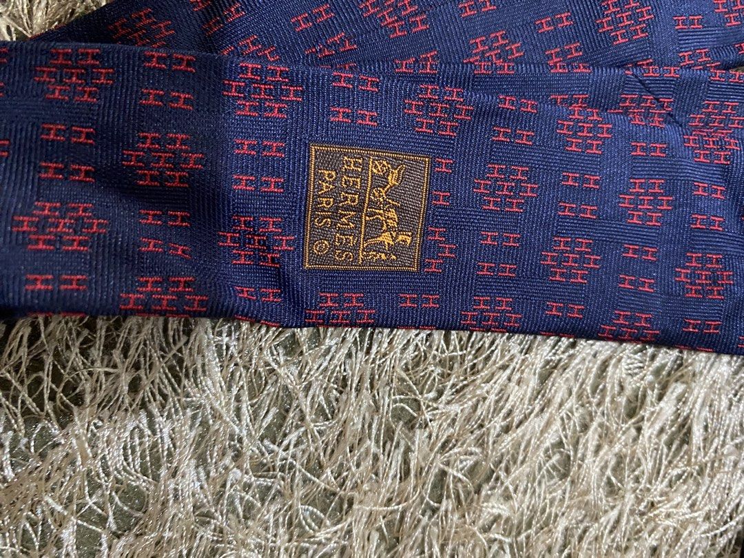 Hermes Paris Silk Tie Navy Red Pattern (Category: Ties) located in Bulacan. Submitted by rich2545 (Listing ID 1462906877, Image 2). Description: - Authentic Hermes Paris Tie - 100% Silk - Classic Red 'H' Pattern on Navy Blue - Made in France - Elevates any outfit.