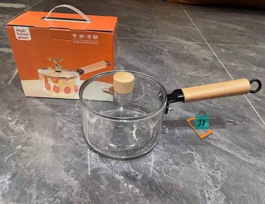 High Borosilicate Glass Single Handle Soup Pot with Lid (Category: Cookware & Accessories) located in Manila. Submitted by chaionlineshop (Listing ID 1462993843, Image 1). Description: - Clear glass soup pot with a single wooden handle. - Made from durable high borosilicate glass. - Ideal for both cooking and serving your favorite dishes. - Easy to clean and adds a stylish touch to your kitchen. - Box indicates 'High boron glass'..